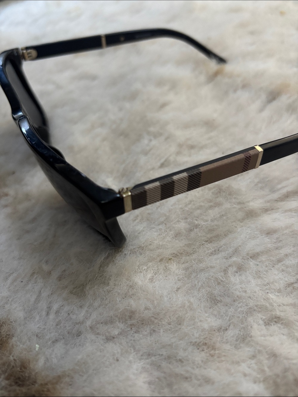 Classic Black Sunglasses with Brown Plaid Temple Accent